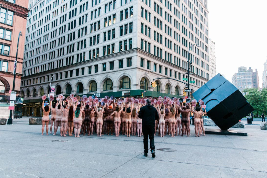 Dozens strip down outside Facebook office to protest nudity rules on social network