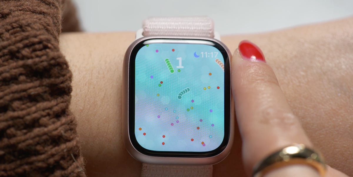 The Apple Watch with the Snake.io app onscreen