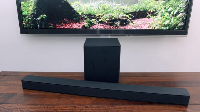 sound bar and subwoofer in front of TV