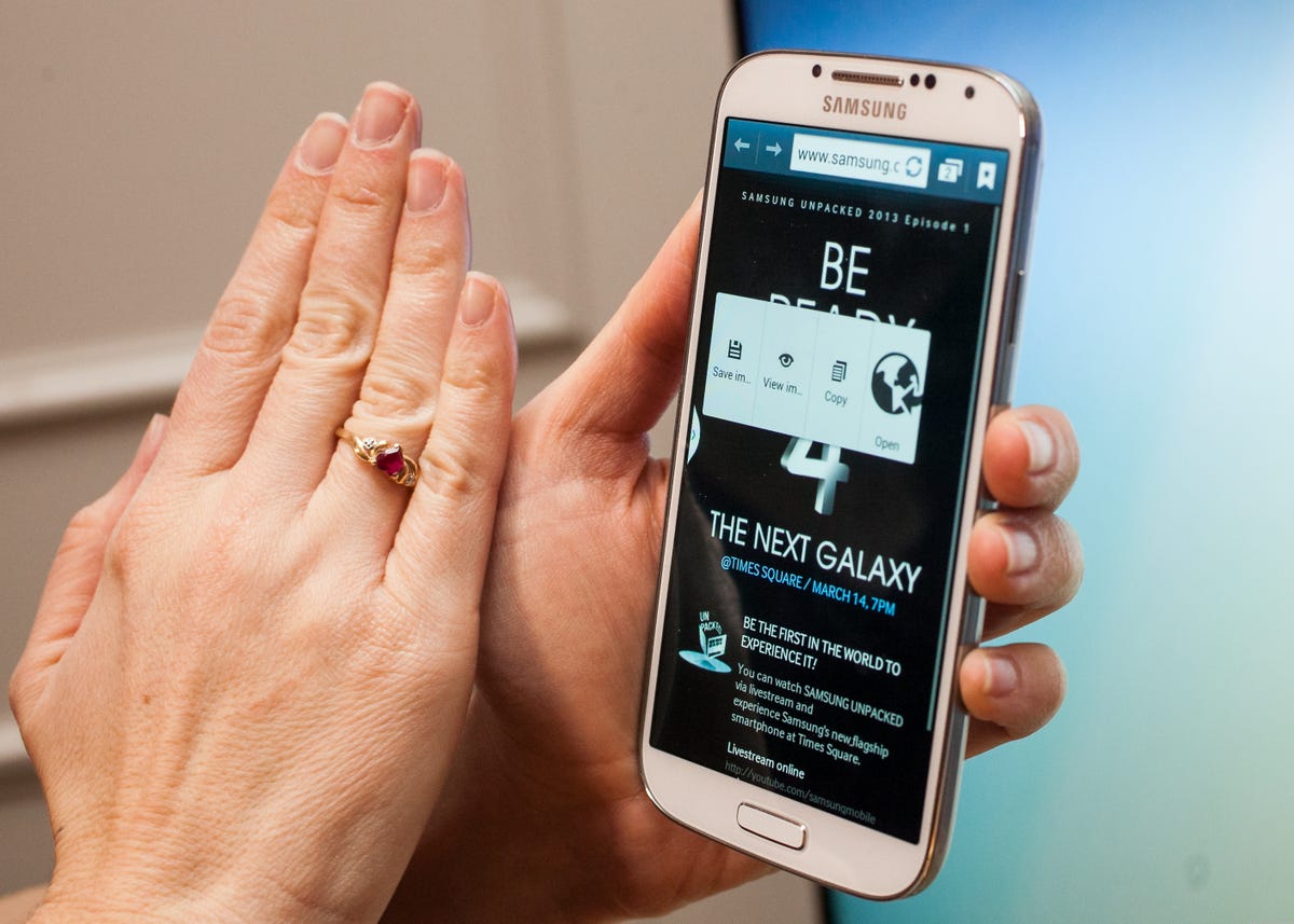On Samsung's Galaxy S4 and others, a wave of your hand can advance your photo album, and then some.