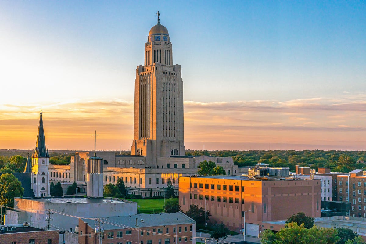 Nebraska State Capitol landscape at sunrise in Lincoln, Nebraska.