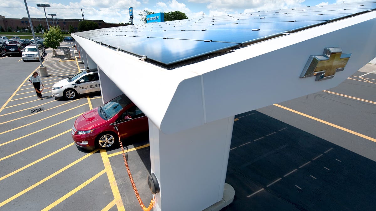A solar canopy from Sunlogics charging Chevy Volts at a GM dealership.