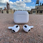 Apple AirPods 3rd gen on concrete