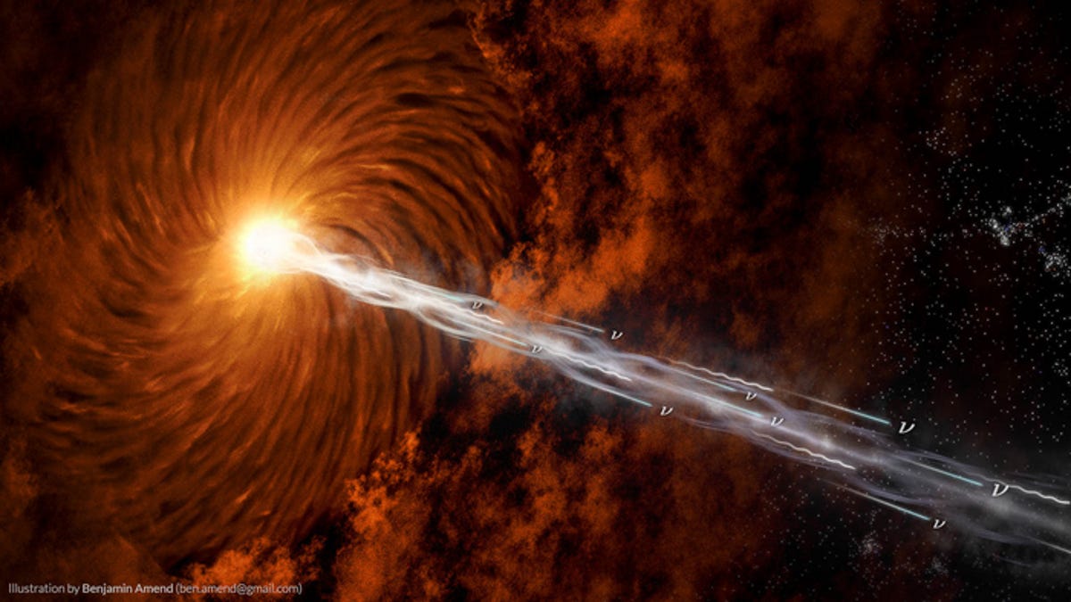 A fiery-looking, red-orange energetic jet blasting bright light from the center of a galaxy.
