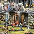 A field of miniature Star War figures in a fight scene