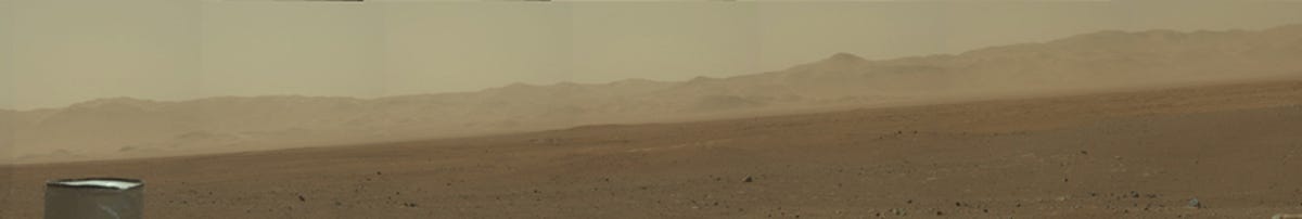 This image is the first high-resolution color mosaic from NASA's Curiosity rover, showing the geological environment around the rover's landing site in Gale Crater on Mars.
