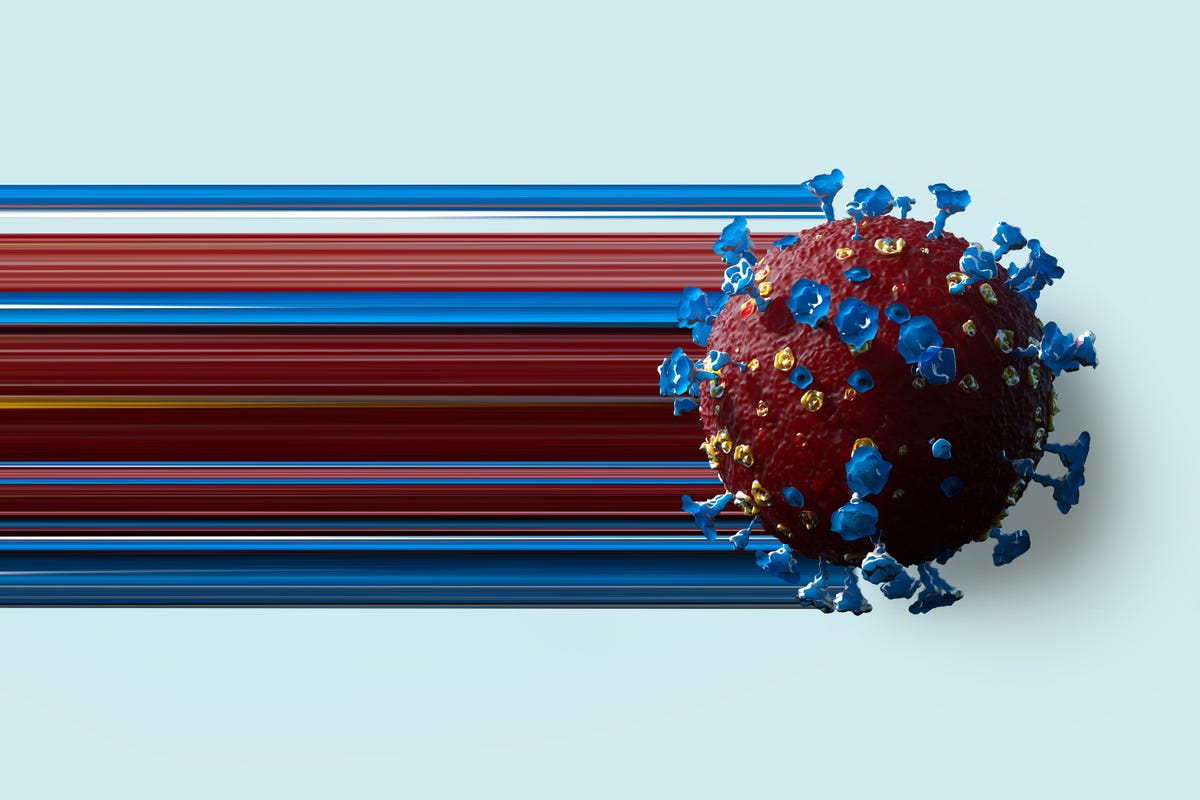 A red-and-blue rainbow illustration of the virus that causes COVID