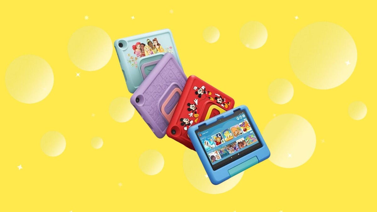 4 Amazon kids fire tablets on a yellow background