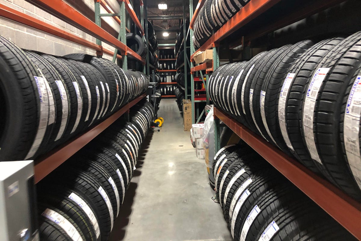 Racks of tires in an NTB storeroom.