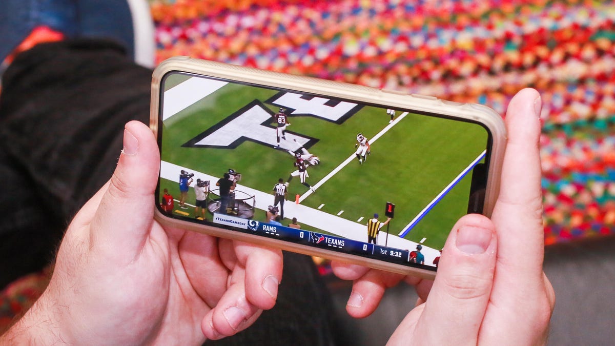 An NFL game being watched on an iPhone