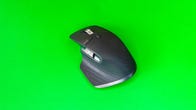 Logitech MX Master 3S mouse on a green background