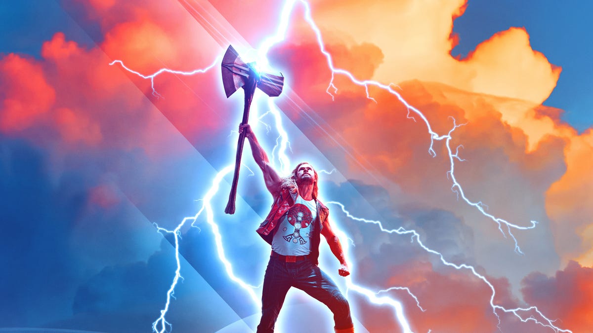 thor raising hammer as lightning strikes in sky