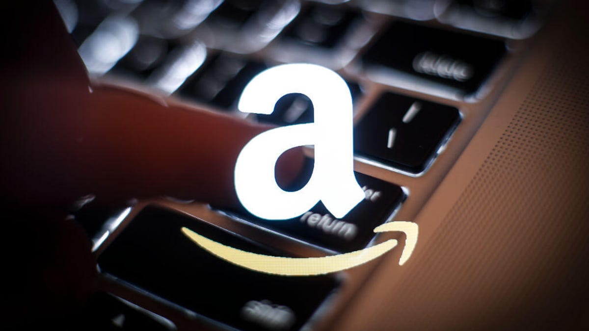Amazon logo superimposed on photo of computer keyboard