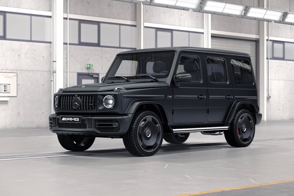 Front 3/4 view of a matte black Mercedes-AMG G63 showing new monoblock wheels