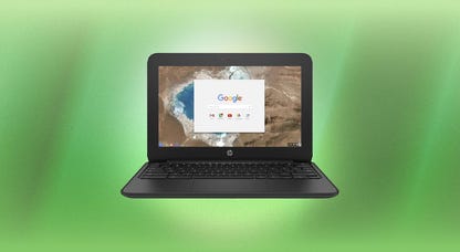 An HP Chromebook against a green background.