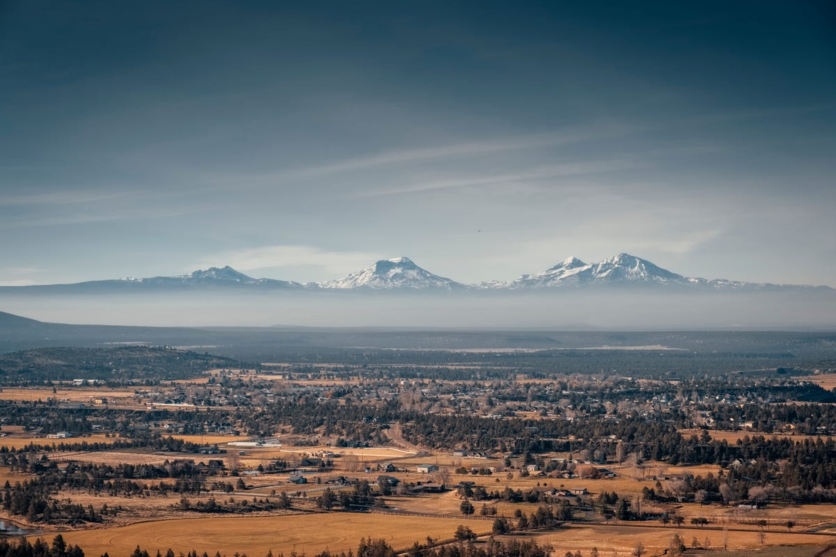 Oregon farmland with the Cascade Mountains in the background.