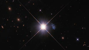 NASA Spots Dwarf Galaxy 'Peekaboo,' a Time Machine to the Young Universe