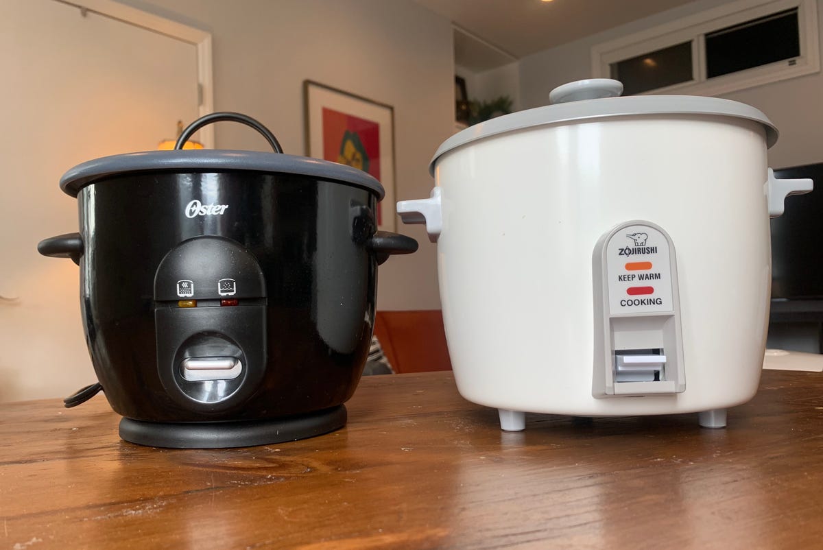 Two rice cookers on a table