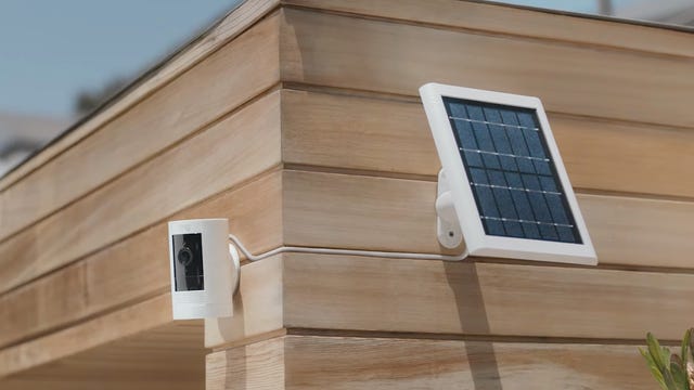 A solar-powered security system outside a house