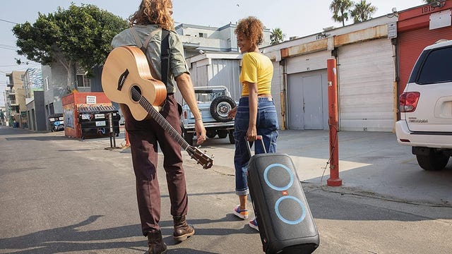 The jumbo JBL Partybox 310 speaker has a built-in wheels and retractable handle.