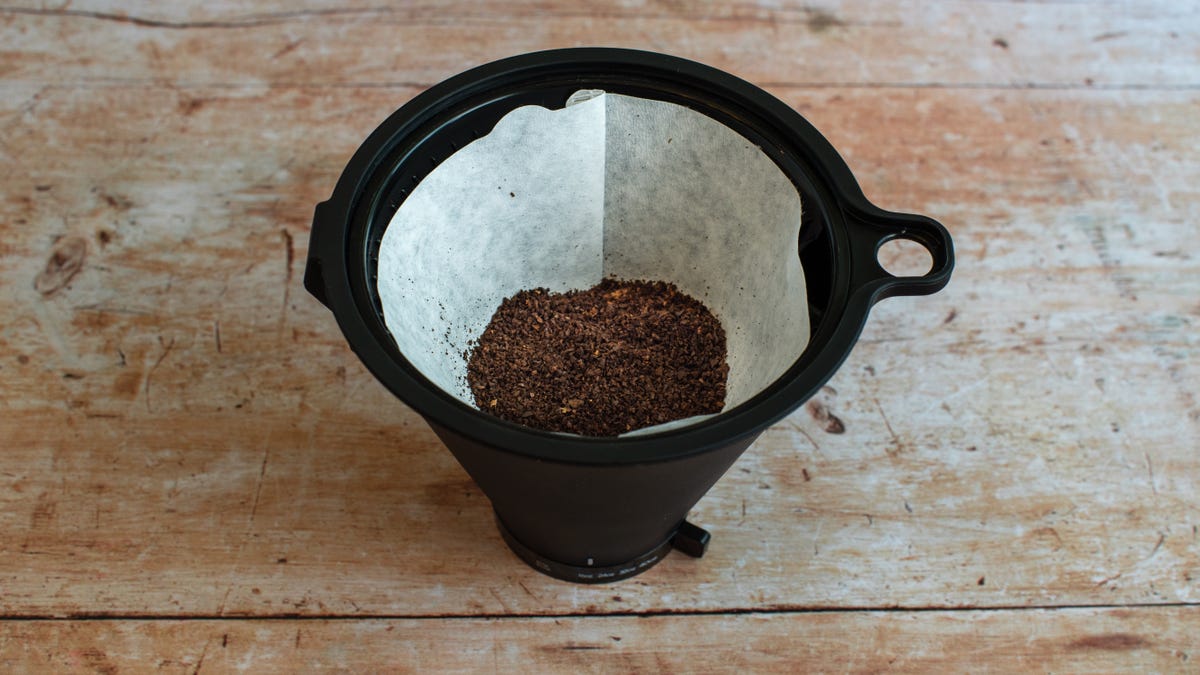 Wilfa Performance's brew basket with filter and coffee grounds.