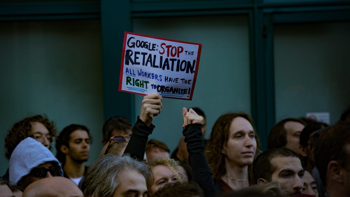 Protesters with a sign: "Google: Stop the retaliation. All workers have the right to organize!"