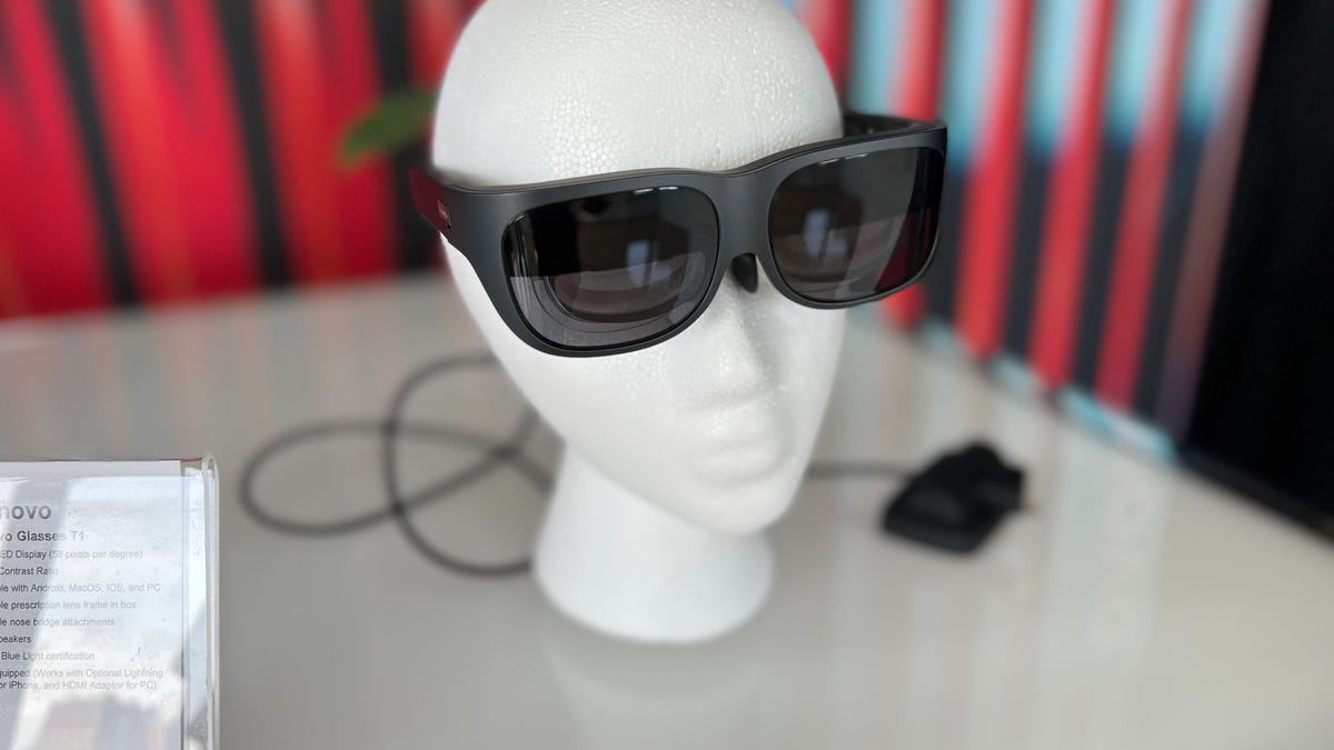 Lenovo Glasses T1, a pair of black smart glasses, on a mannequin head