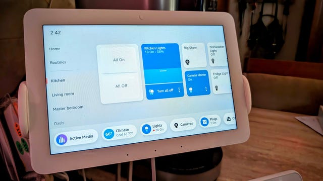 Amazon Echo Hub on a counter showing smart home controls
