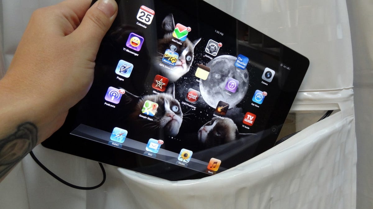 Placing iPad in ShowerTunes pocket