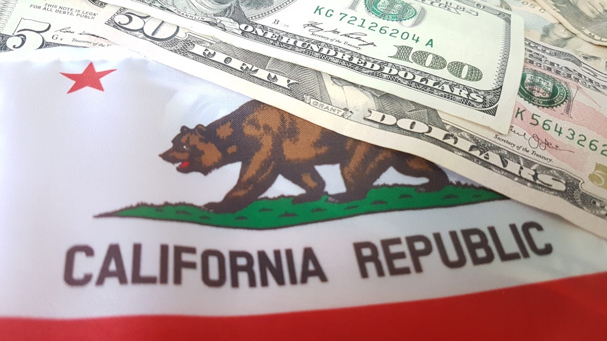 California flag with 100 dollar bill