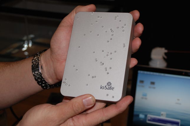 The ioSafe Rugged Portable external hard drive riddled with bullet holes is a nice souvenir to bring home from CES 2011.