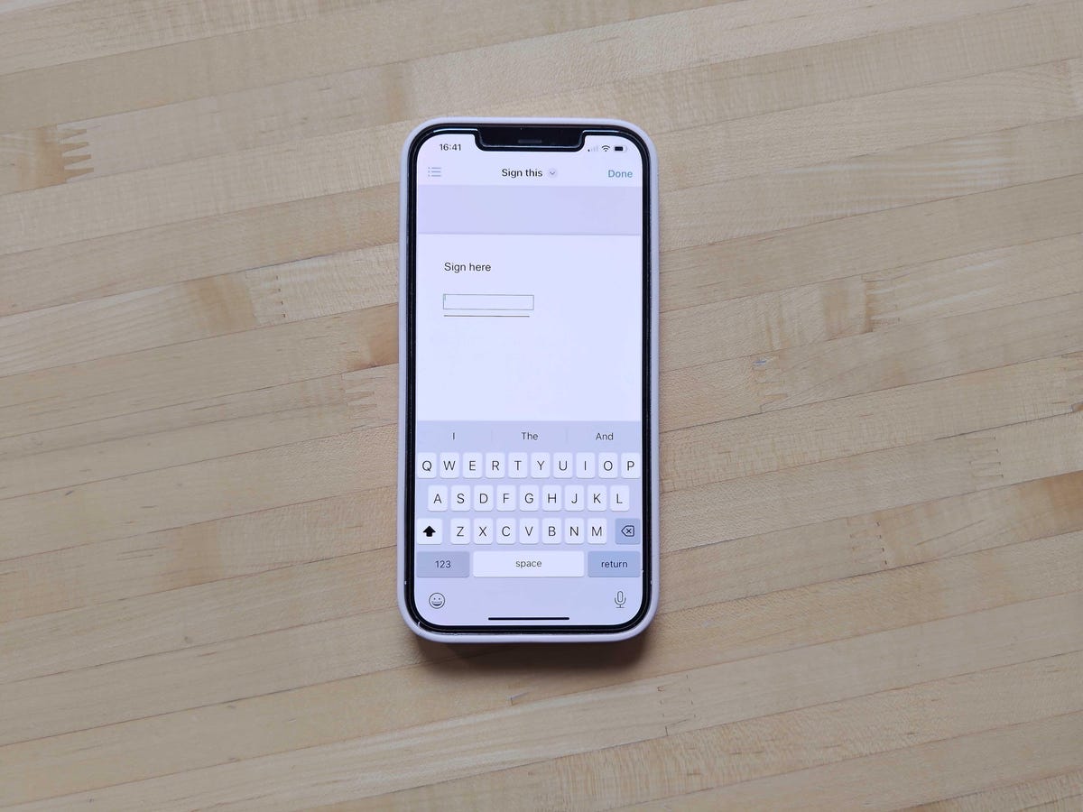 Adding a text box into a document in Apple's Files app.