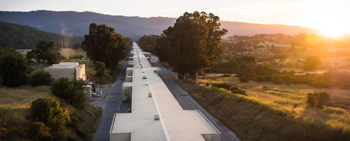 SLAC's linear accelerator stretches in a straight line across the hills of Palo Alto, California. This view looks west toward the front end of the accelerator.
