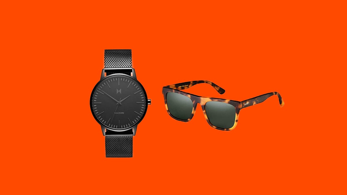 A men&apos;s watch in black and a pair of unisex leopard print sunglasses on an orange background