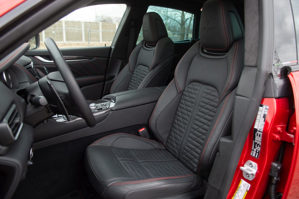 2022 Maserati Levante Trofeo in red, showing the black leather seats with red contrast stitching
