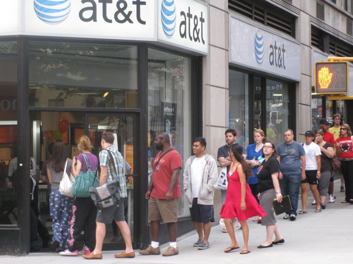 Dozens of people lined up early Tuesday morning in front of this AT&T store to get the new iPhone 4. The store was sold out of the phones by 7:30 a.m., a half hour after it opened.