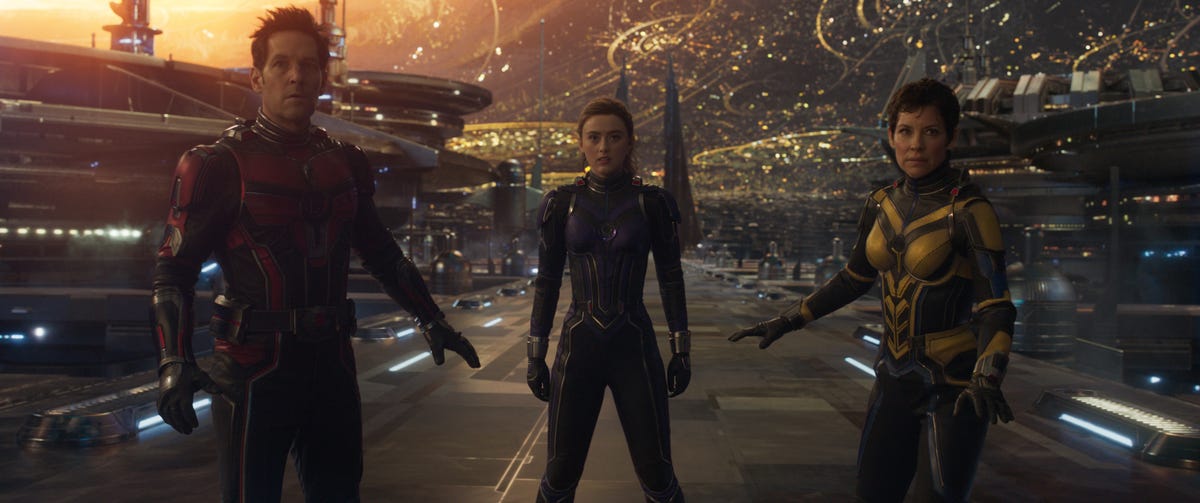 Scott, Cassie, and Hope stand on a bridge and watch something in Ant-Man and the Wasp: Quantumania