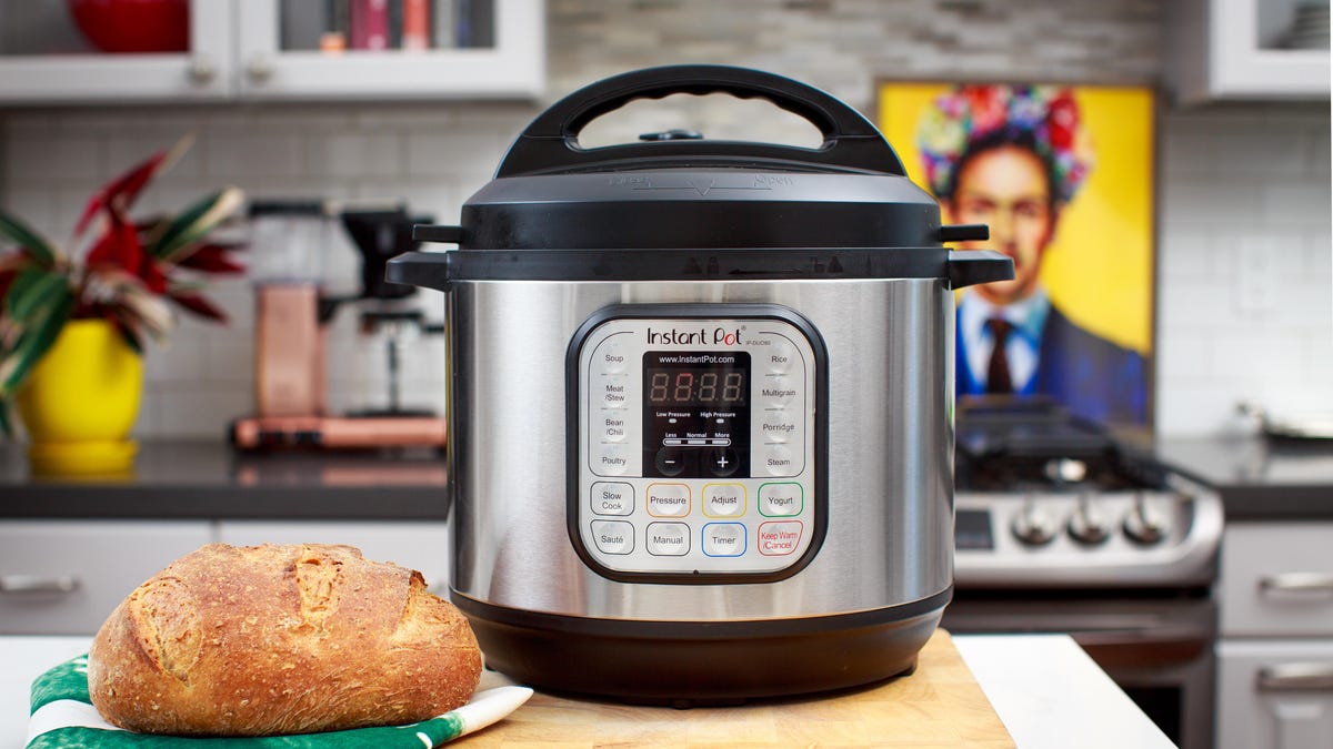 loaf of bread next to an Instant Pot