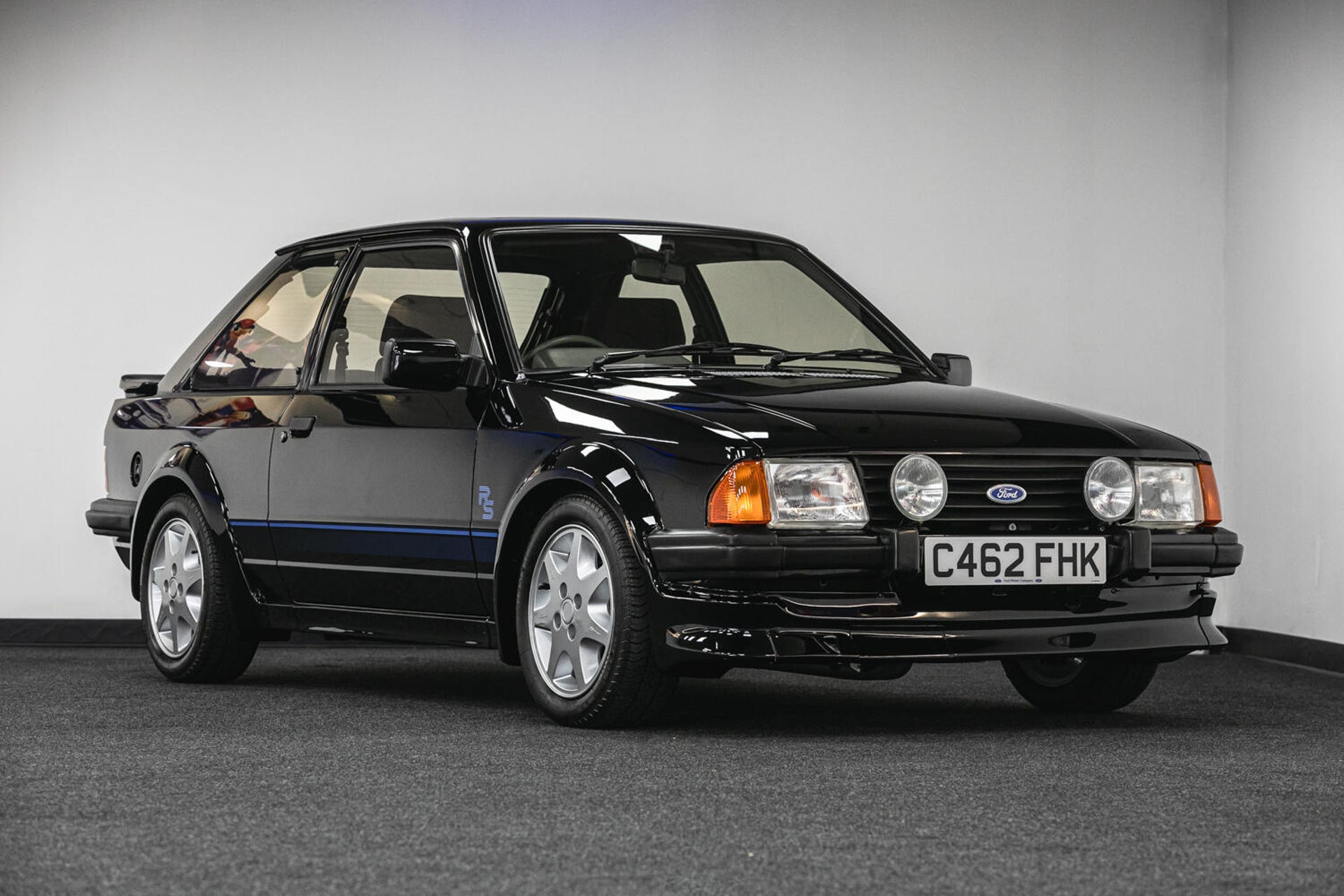 Front 3/4 view of Princess Diana's black 1985 Ford Escort RS Turbo