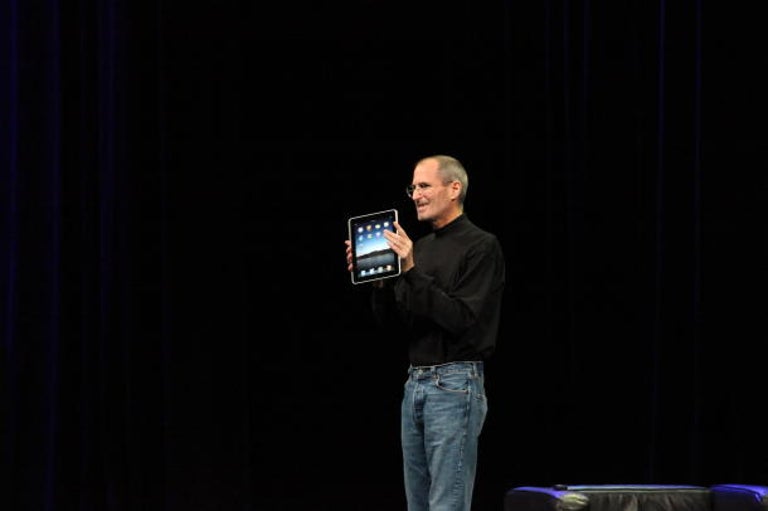 Late Apple co-founder Steve Jobs showing off the iPad for the first time in 2010. The device turned two years old this week.