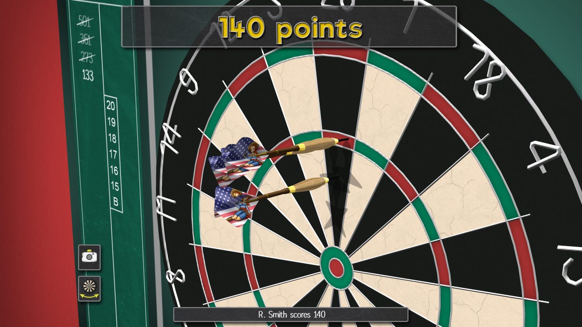 Screenshot from Pro Darts 2022 game. Images shows a standard darts board with a few darts.