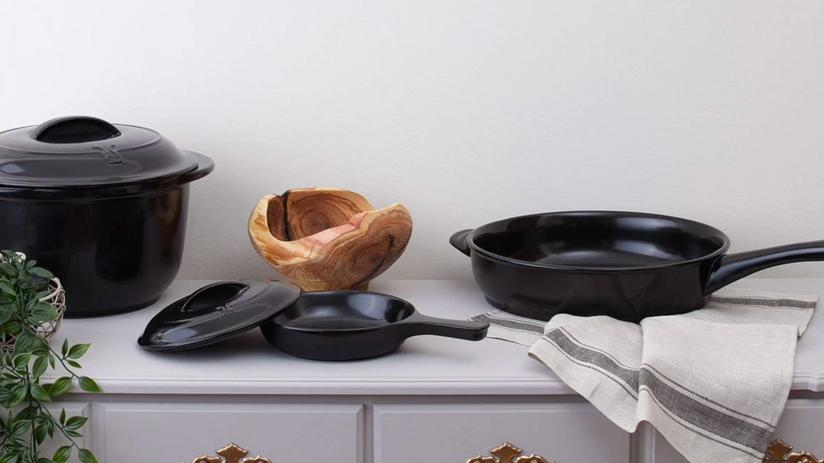 black ceramic pots and pans on counter