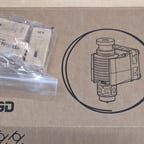 A box with 3 nozzles and the hotend from e3d