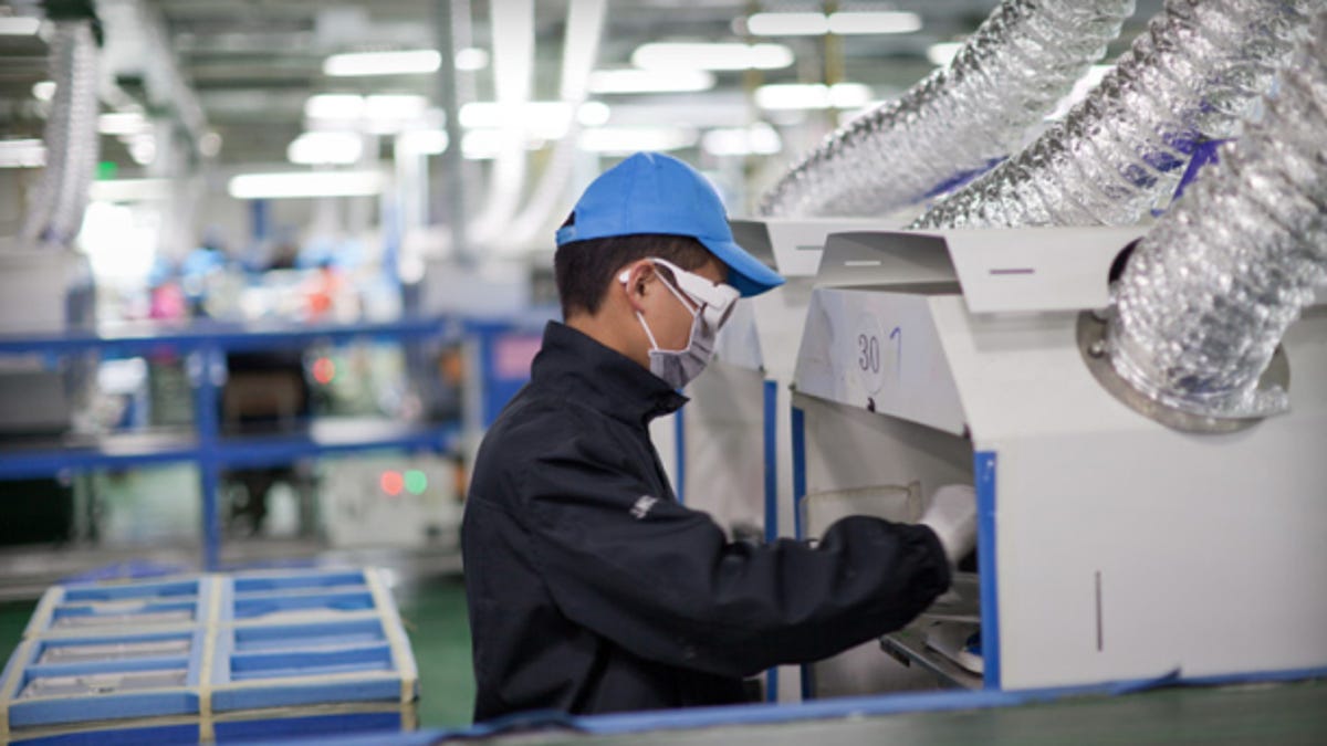 A worker at an Apple facility in Chengdu, China.