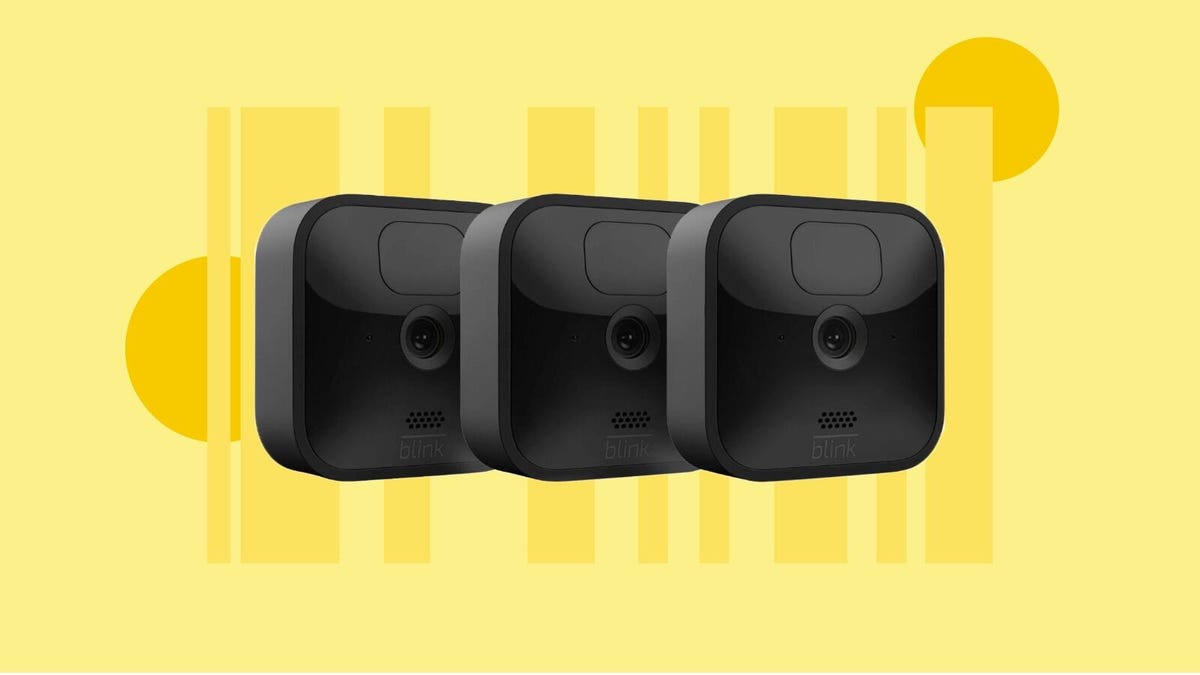 two Blink Outdoor 3 cameras on a yellow background