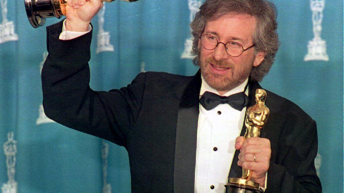 US director Steven Spielberg poses with his two Oscars