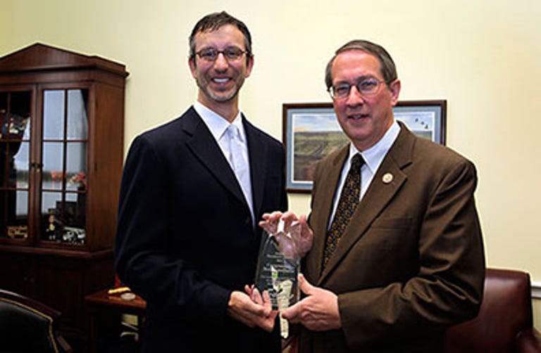Incoming Judiciary chairman Bob Goodlatte receiving the 2011 President's Award from another pro-SOPA music industry group, which praised him for his 