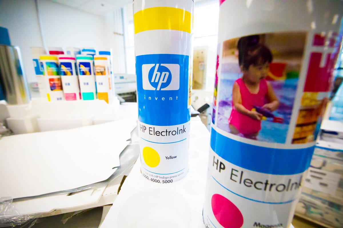 ​HP's Indigo printing systems can spit out 240 full-color pages a minute for high-end products like custom photo books -- but they consume expensive ink by the jug.