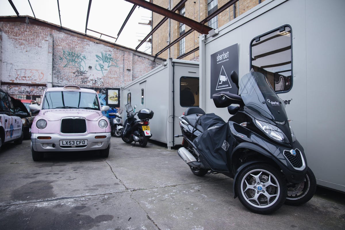 Sherbet's Knowledge school occupies two temporary buildings in the company's taxi repair yard.