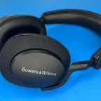 Bowers & Wilkins PX7 S2 headphones on a blue background